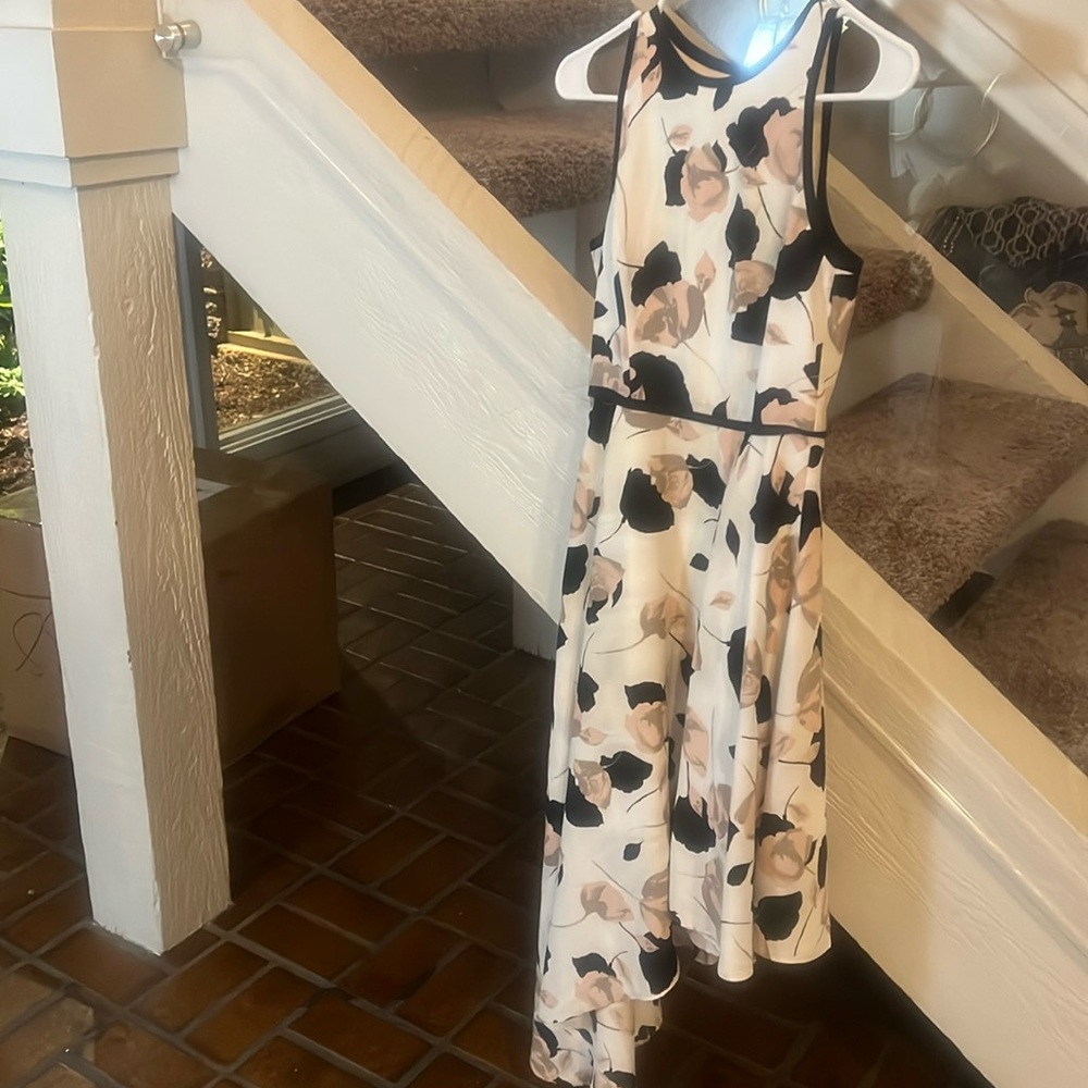 Asymetrical hemline stunning dress size 0